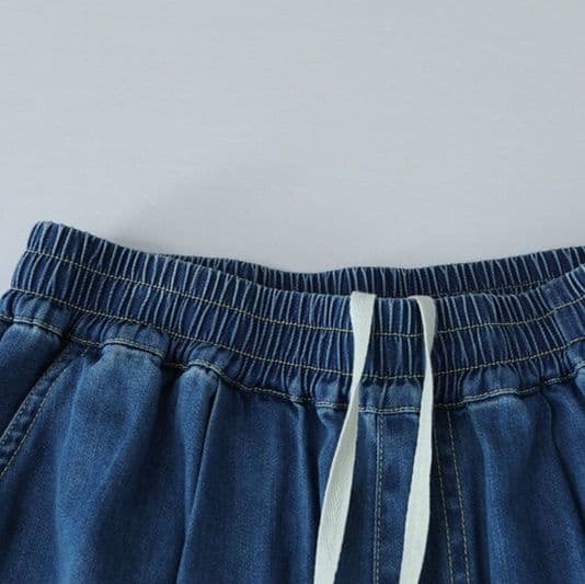 タックワイドパンツ 流れる余裕 タック仕立てデニム