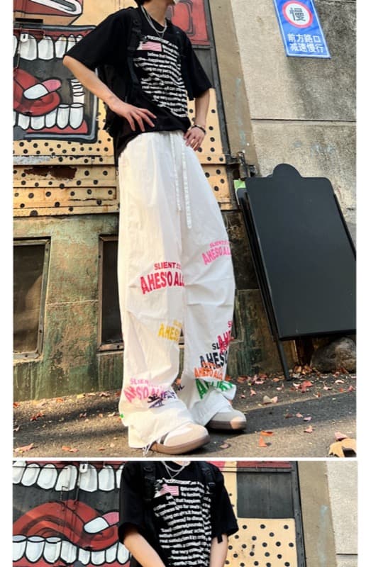 タックワイドパンツ 白トップスに映える プリント入りワイドパンツ 薄手速乾